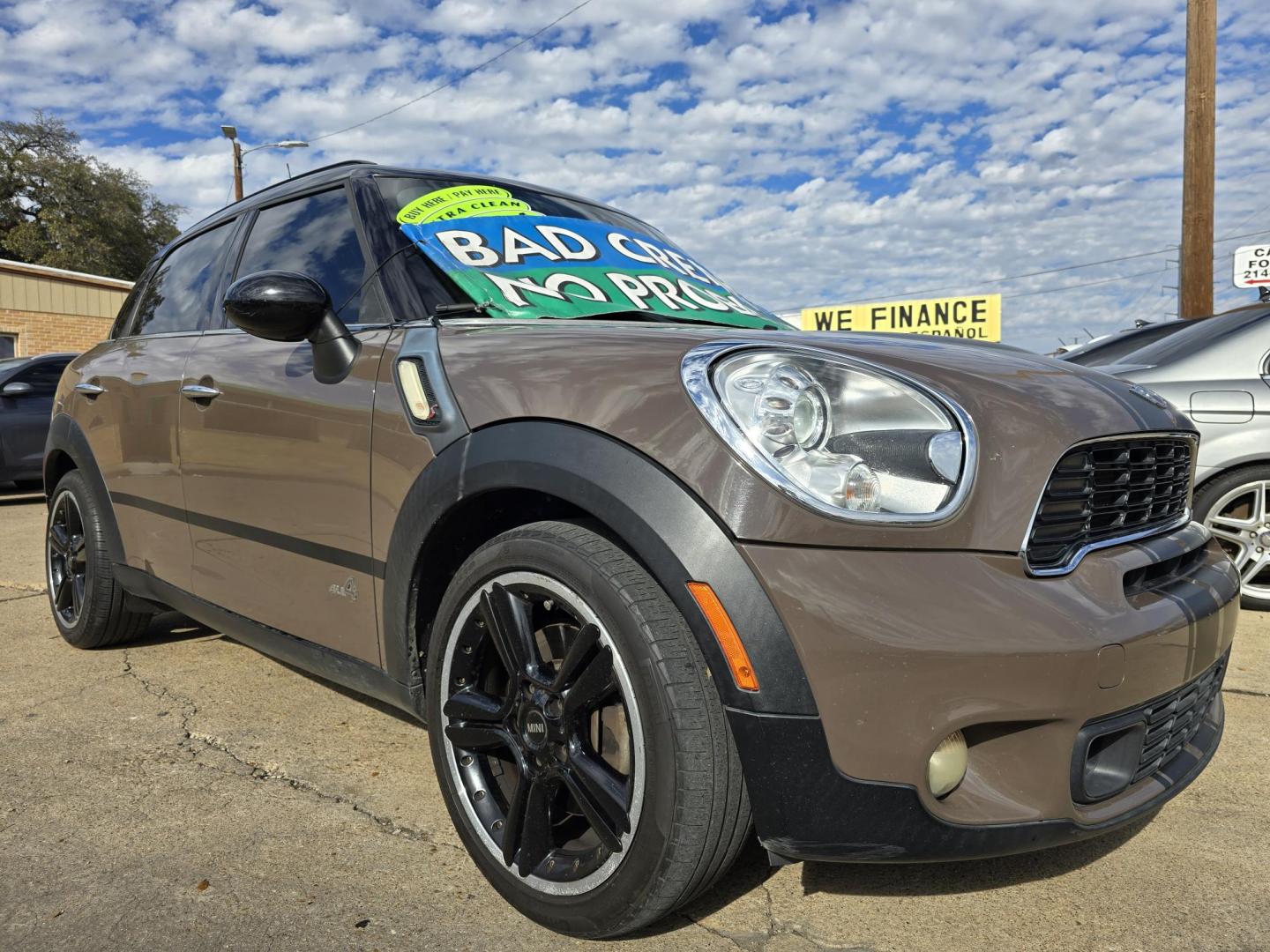 2011 BROWN Mini Cooper S ALL4 COUNTRYMAN (WMWZC5C59BW) with an 1.6L L4 DOHC 16V TURBO engine, AUTO transmission, located at 2660 S.Garland Avenue, Garland, TX, 75041, (469) 298-3118, 32.885551, -96.655602 - Photo#1