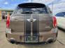 2011 BROWN Mini Cooper S ALL4 COUNTRYMAN (WMWZC5C59BW) with an 1.6L L4 DOHC 16V TURBO engine, AUTO transmission, located at 2660 S.Garland Avenue, Garland, TX, 75041, (469) 298-3118, 32.885551, -96.655602 - Photo#4