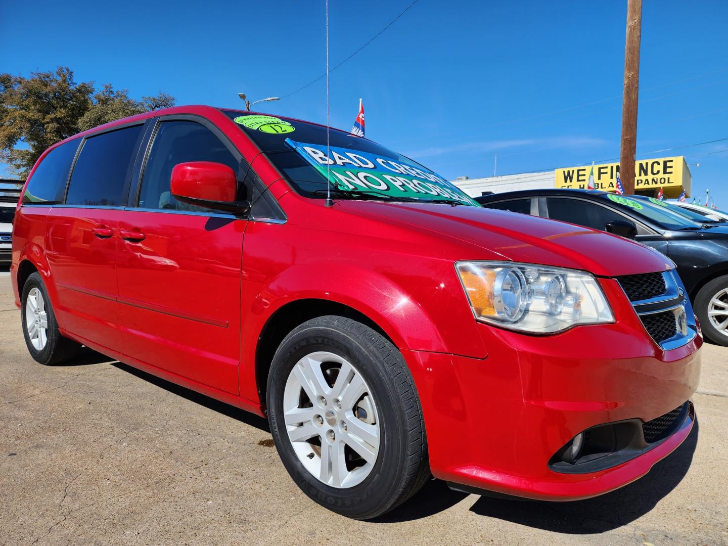 2012 RED DODGE GRAND CARAVAN CREW CREW (2C4RDGDG0CR) , AUTO transmission, located at 2660 S.Garland Avenue, Garland, TX, 75041, (469) 298-3118, 32.885551, -96.655602 - Welcome to DallasAutos4Less, one of the Premier BUY HERE PAY HERE Dealers in the North Dallas Area. We specialize in financing to people with NO CREDIT or BAD CREDIT. We need proof of income, proof of residence, and a ID. Come buy your new car from us today!! This is a very clean 2012 DODGE GRAND - Photo#1