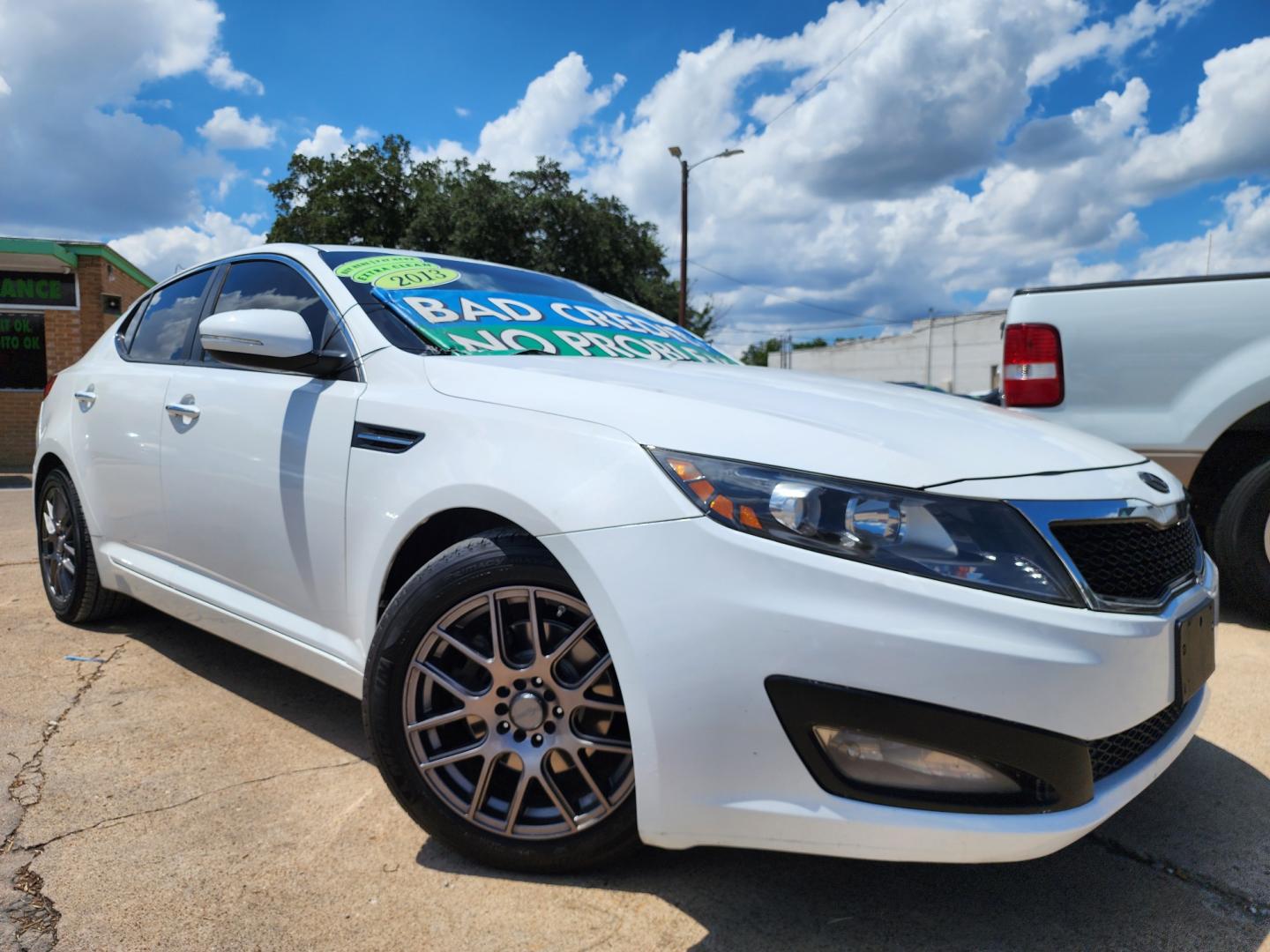 2013 DIAMOND WHITE /BLACK Kia Optima EX (5XXGN4A7XDG) with an 2.4L L4 DOHC 16V engine, 6-Speed Automatic transmission, located at 2660 S.Garland Avenue, Garland, TX, 75041, (469) 298-3118, 32.885551, -96.655602 - Welcome to DallasAutos4Less, one of the Premier BUY HERE PAY HERE Dealers in the North Dallas Area. We specialize in financing to people with NO CREDIT or BAD CREDIT. We need proof of income, proof of residence, and a ID. Come buy your new car from us today!! This is a Very clean 2037 KIA OPTIMA - Photo#0