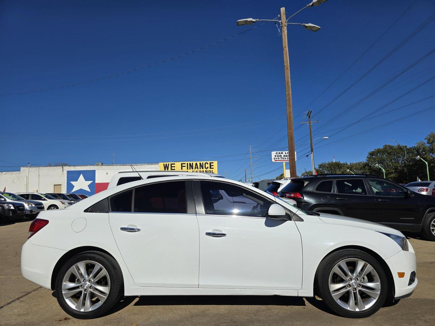 2013 WHITE /BEIGE Chevrolet Cruze LTZ (1G1PG5SB0D7) with an 1.4L L4 DOHC 16V TURBO engine, 6-Speed Automatic transmission, located at 2660 S.Garland Avenue, Garland, TX, 75041, (469) 298-3118, 32.885551, -96.655602 - Welcome to DallasAutos4Less, one of the Premier BUY HERE PAY HERE Dealers in the North Dallas Area. We specialize in financing to people with NO CREDIT or BAD CREDIT. We need proof of income, proof of residence, and a ID. Come buy your new car from us today!! This is a very well cared for 2013 CH - Photo#2