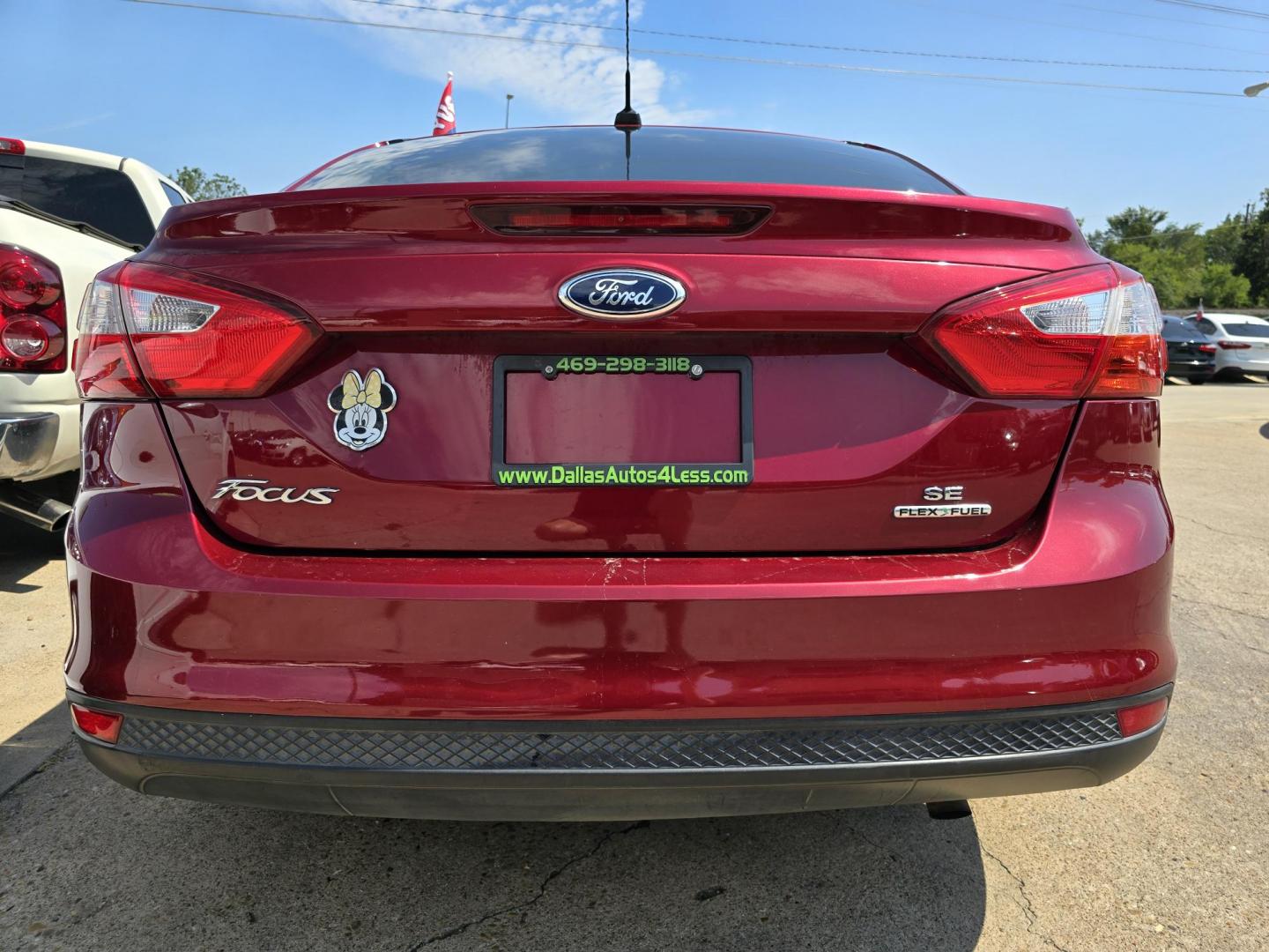 2014 RED /BEIGE FORD FOCUS SE SE (1FADP3F24EL) , AUTO transmission, located at 2660 S.Garland Avenue, Garland, TX, 75041, (469) 298-3118, 32.885551, -96.655602 - Welcome to DallasAutos4Less, one of the Premier BUY HERE PAY HERE Dealers in the North Dallas Area. We specialize in financing to people with NO CREDIT or BAD CREDIT. We need proof of income, proof of residence, and a ID. Come buy your new car from us today!! This is a Very clean 2014 FORD FOCUS - Photo#4