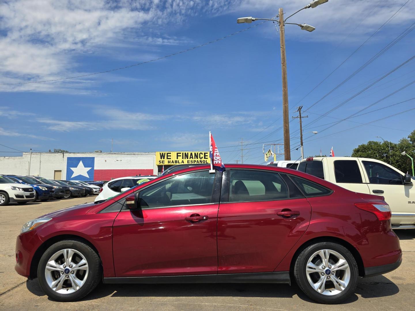 2014 RED /BEIGE FORD FOCUS SE SE (1FADP3F24EL) , AUTO transmission, located at 2660 S.Garland Avenue, Garland, TX, 75041, (469) 298-3118, 32.885551, -96.655602 - Welcome to DallasAutos4Less, one of the Premier BUY HERE PAY HERE Dealers in the North Dallas Area. We specialize in financing to people with NO CREDIT or BAD CREDIT. We need proof of income, proof of residence, and a ID. Come buy your new car from us today!! This is a Very clean 2014 FORD FOCUS - Photo#6