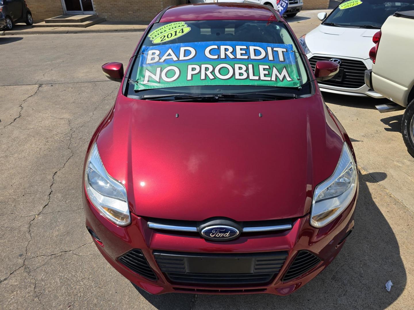 2014 RED /BEIGE FORD FOCUS SE SE (1FADP3F24EL) , AUTO transmission, located at 2660 S.Garland Avenue, Garland, TX, 75041, (469) 298-3118, 32.885551, -96.655602 - Welcome to DallasAutos4Less, one of the Premier BUY HERE PAY HERE Dealers in the North Dallas Area. We specialize in financing to people with NO CREDIT or BAD CREDIT. We need proof of income, proof of residence, and a ID. Come buy your new car from us today!! This is a Very clean 2014 FORD FOCUS - Photo#8