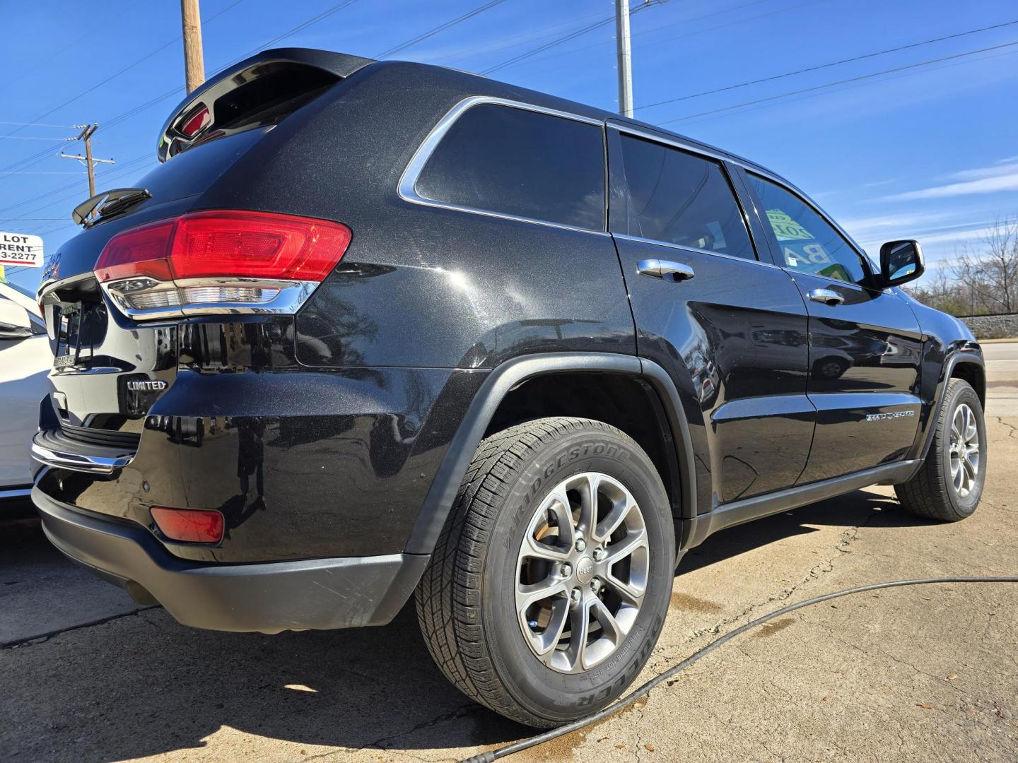 2014 BLACK Jeep Grand Cherokee Limited (1C4RJEBG6EC) with an 3.6L V6 DOHC 24V engine, 5-Speed Automatic transmission, located at 2660 S.Garland Avenue, Garland, TX, 75041, (469) 298-3118, 32.885551, -96.655602 - Photo#3