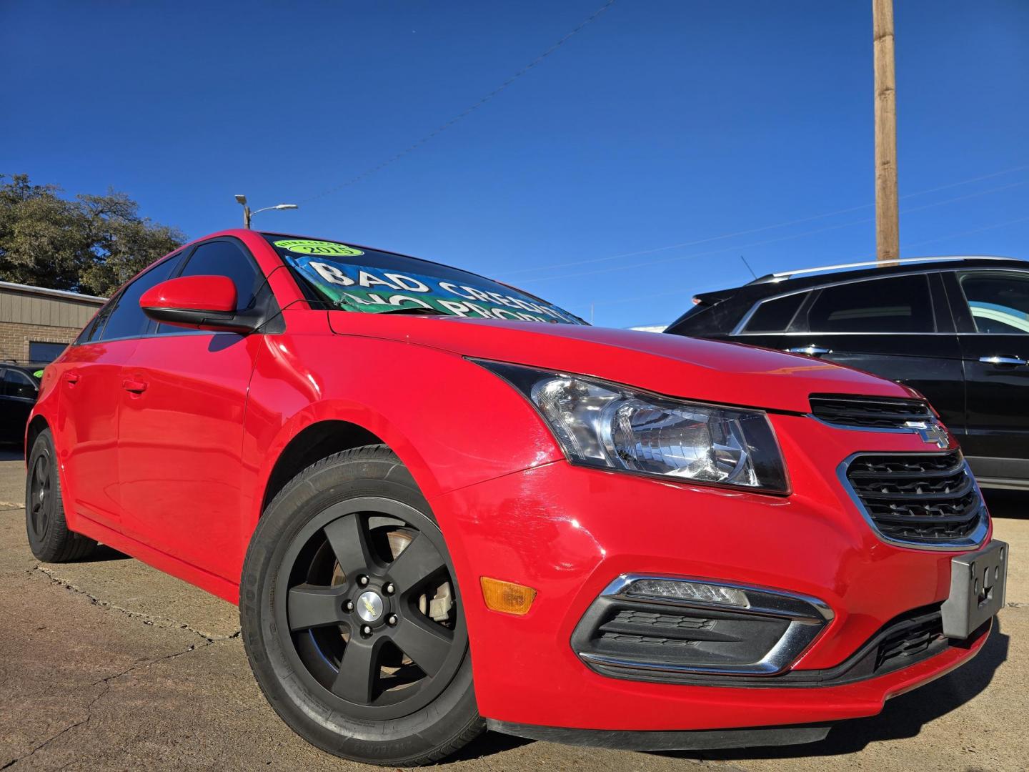 2015 RED /BLACK Chevrolet Cruze 1LT (1G1PC5SB0F7) with an 1.4L L4 DOHC 16V TURBO engine, 6-Speed Automatic transmission, located at 2660 S.Garland Avenue, Garland, TX, 75041, (469) 298-3118, 32.885551, -96.655602 - Welcome to DallasAutos4Less, one of the Premier BUY HERE PAY HERE Dealers in the North Dallas Area. We specialize in financing to people with NO CREDIT or BAD CREDIT. We need proof of income, proof of residence, and a ID. Come buy your new car from us today!! This is a very well cared for 2015 CH - Photo#0