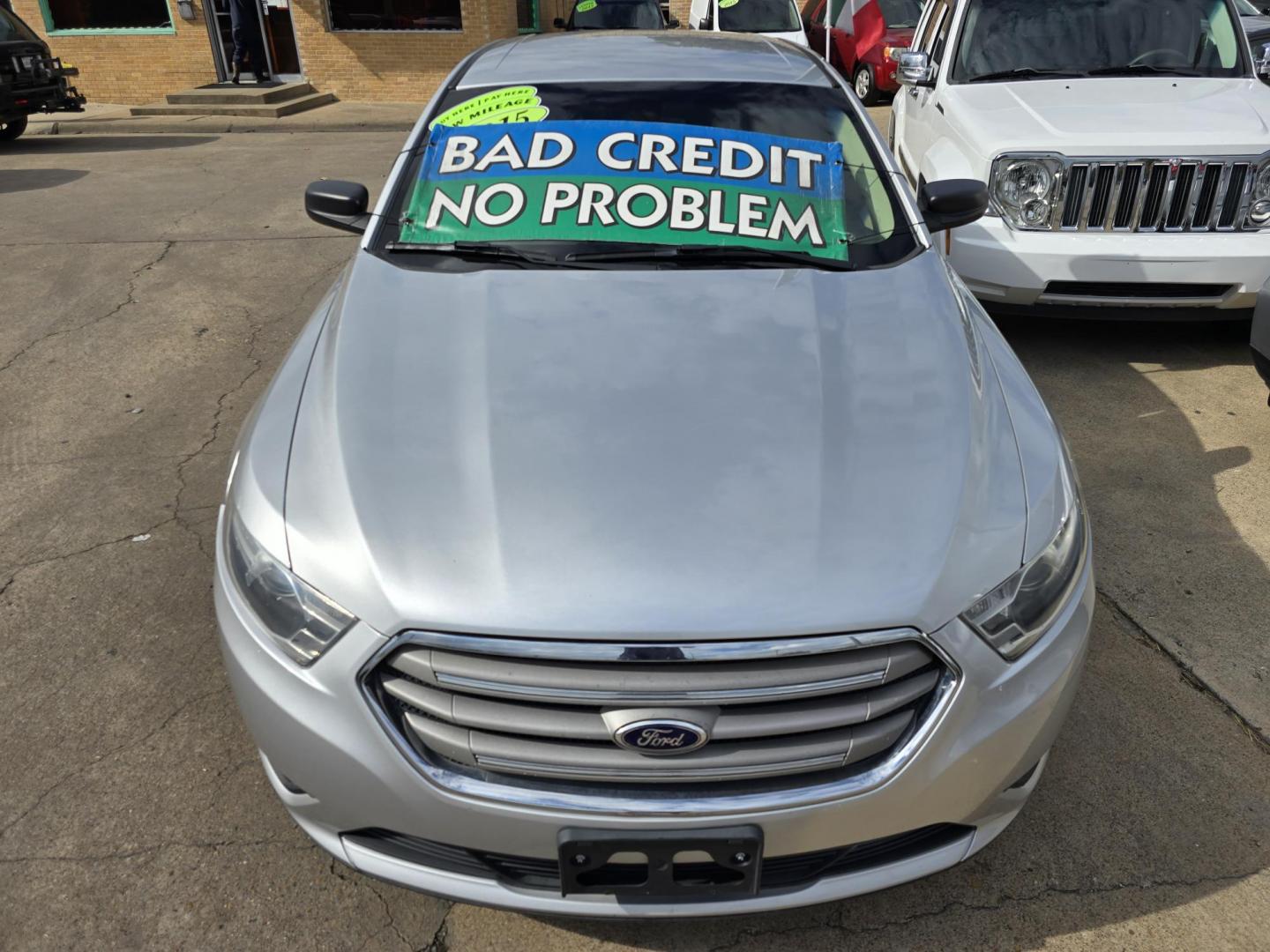 2015 Ford Taurus SE (1FAHP2D84FG) with an 3.5L V6 DOHC 24V engine, 6-Speed Automatic transmission, located at 2660 S.Garland Avenue, Garland, TX, 75041, (469) 298-3118, 32.885551, -96.655602 - Welcome to DallasAutos4Less, one of the Premier BUY HERE PAY HERE Dealers in the North Dallas Area. We specialize in financing to people with NO CREDIT or BAD CREDIT. We need proof of income, proof of residence, and a ID. Come buy your new car from us today!! This is a very well cared for 2015 FO - Photo#8