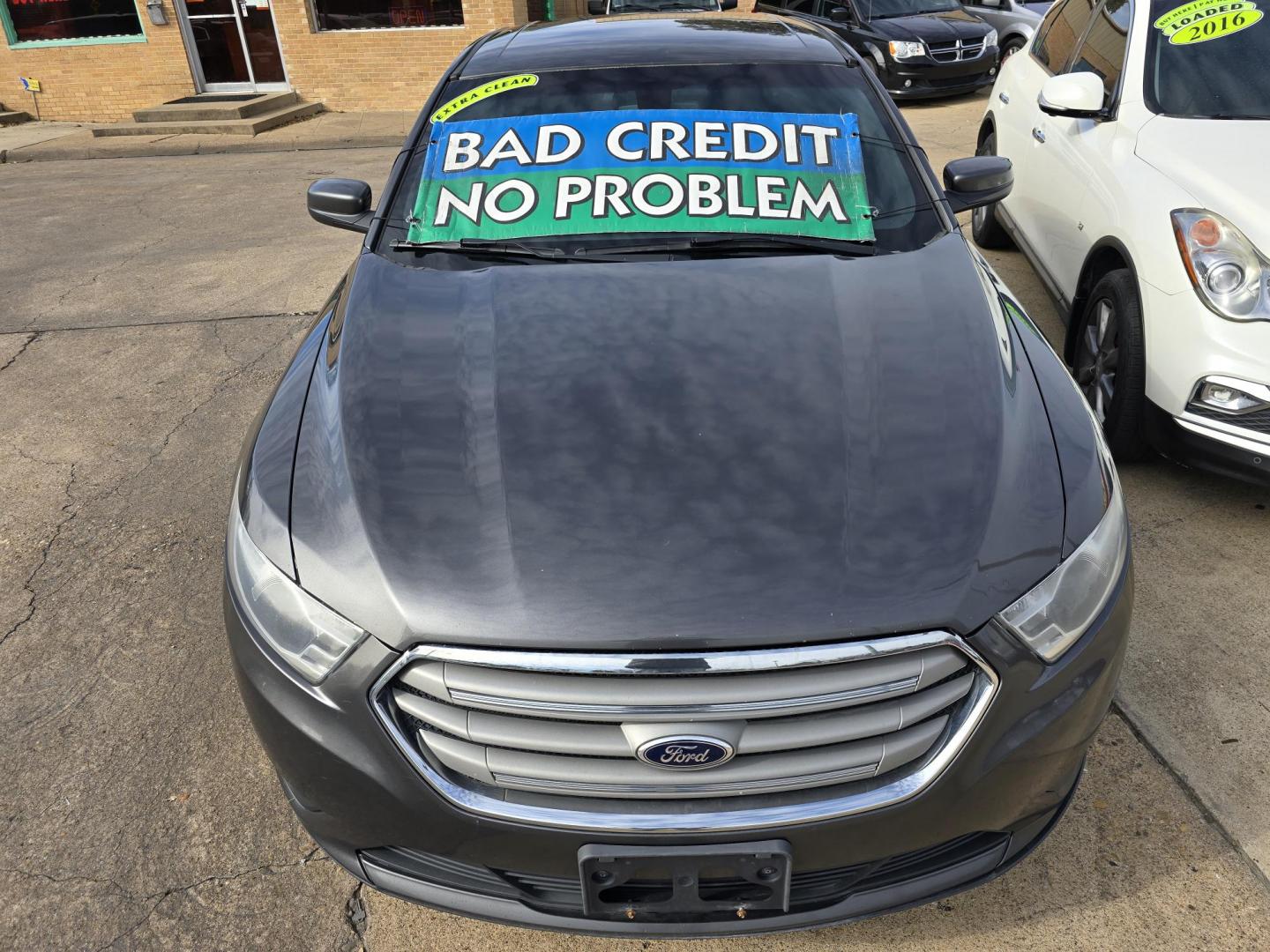 2015 GRAY Ford Taurus SEL (1FAHP2E84FG) with an 3.5L V6 DOHC 24V engine, 6-Speed Automatic transmission, located at 2660 S.Garland Avenue, Garland, TX, 75041, (469) 298-3118, 32.885551, -96.655602 - Photo#8