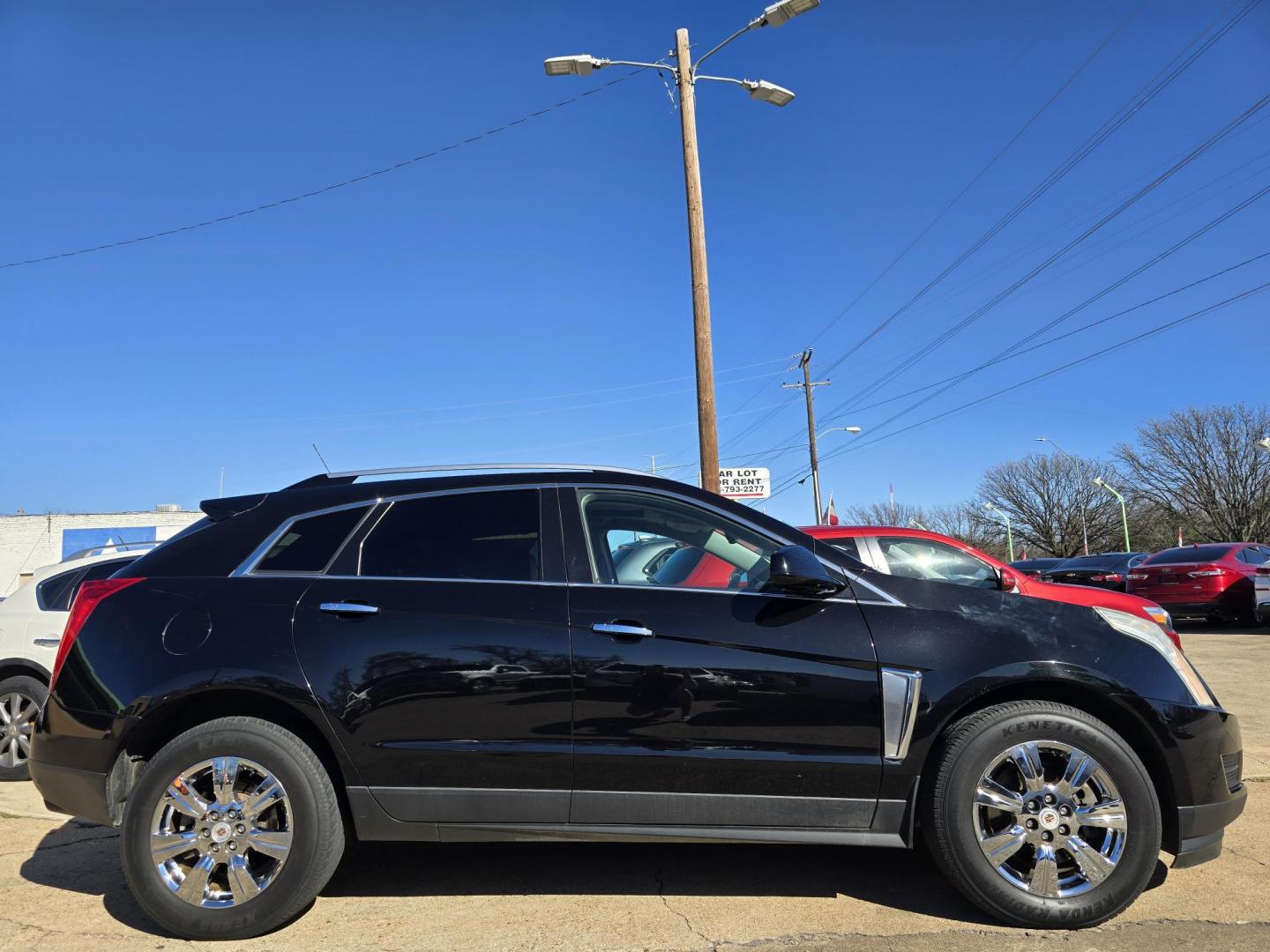 2016 BLACK Cadillac SRX Luxury Collection (3GYFNEE36GS) with an 3.6L V6 DOHC 24V FFV engine, 6A transmission, located at 2660 S.Garland Avenue, Garland, TX, 75041, (469) 298-3118, 32.885551, -96.655602 - Photo#2