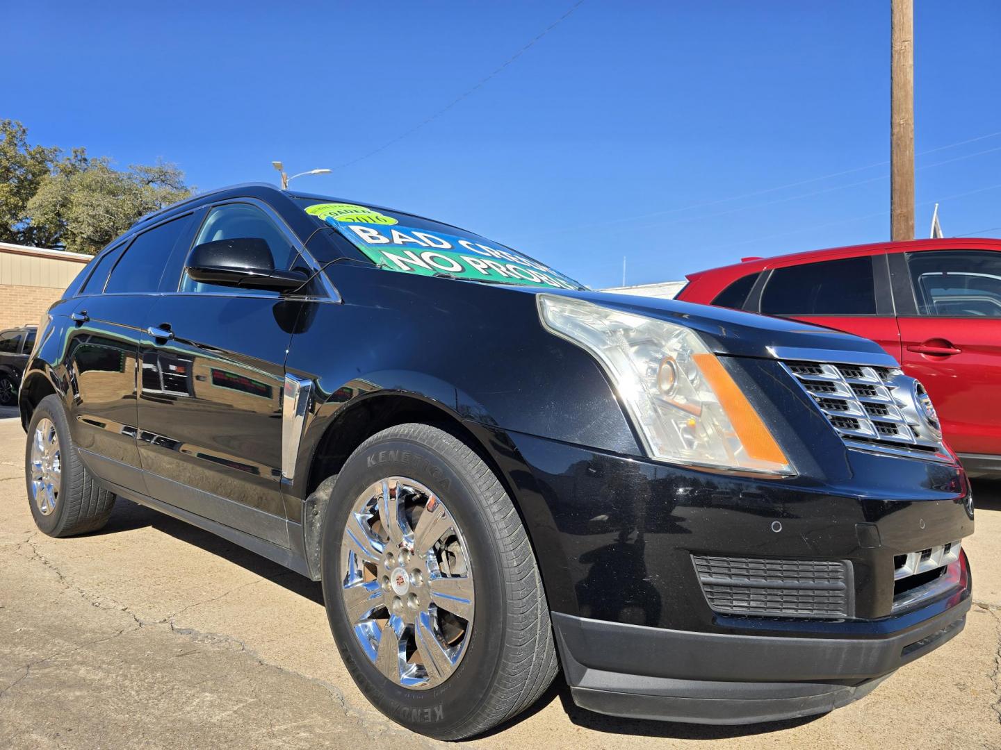 2016 BLACK Cadillac SRX Luxury Collection (3GYFNEE36GS) with an 3.6L V6 DOHC 24V FFV engine, 6A transmission, located at 2660 S.Garland Avenue, Garland, TX, 75041, (469) 298-3118, 32.885551, -96.655602 - Photo#1