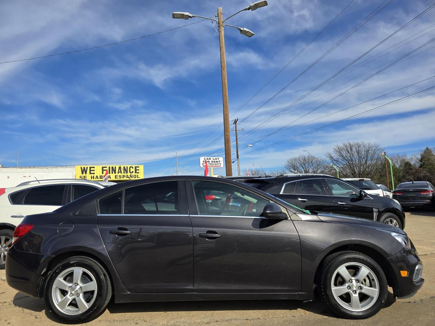 2016 GRAY /BLACK Chevrolet Cruze LT (1G1PE5SB6G7) with an 1.4L L4 DOHC 16V TURBO engine, 6-Speed Automatic transmission, located at 2660 S.Garland Avenue, Garland, TX, 75041, (469) 298-3118, 32.885551, -96.655602 - Welcome to DallasAutos4Less, one of the Premier BUY HERE PAY HERE Dealers in the North Dallas Area. We specialize in financing to people with NO CREDIT or BAD CREDIT. We need proof of income, proof of residence, and a ID. Come buy your new car from us today!! This is a very well cared for 2016 CH - Photo#2