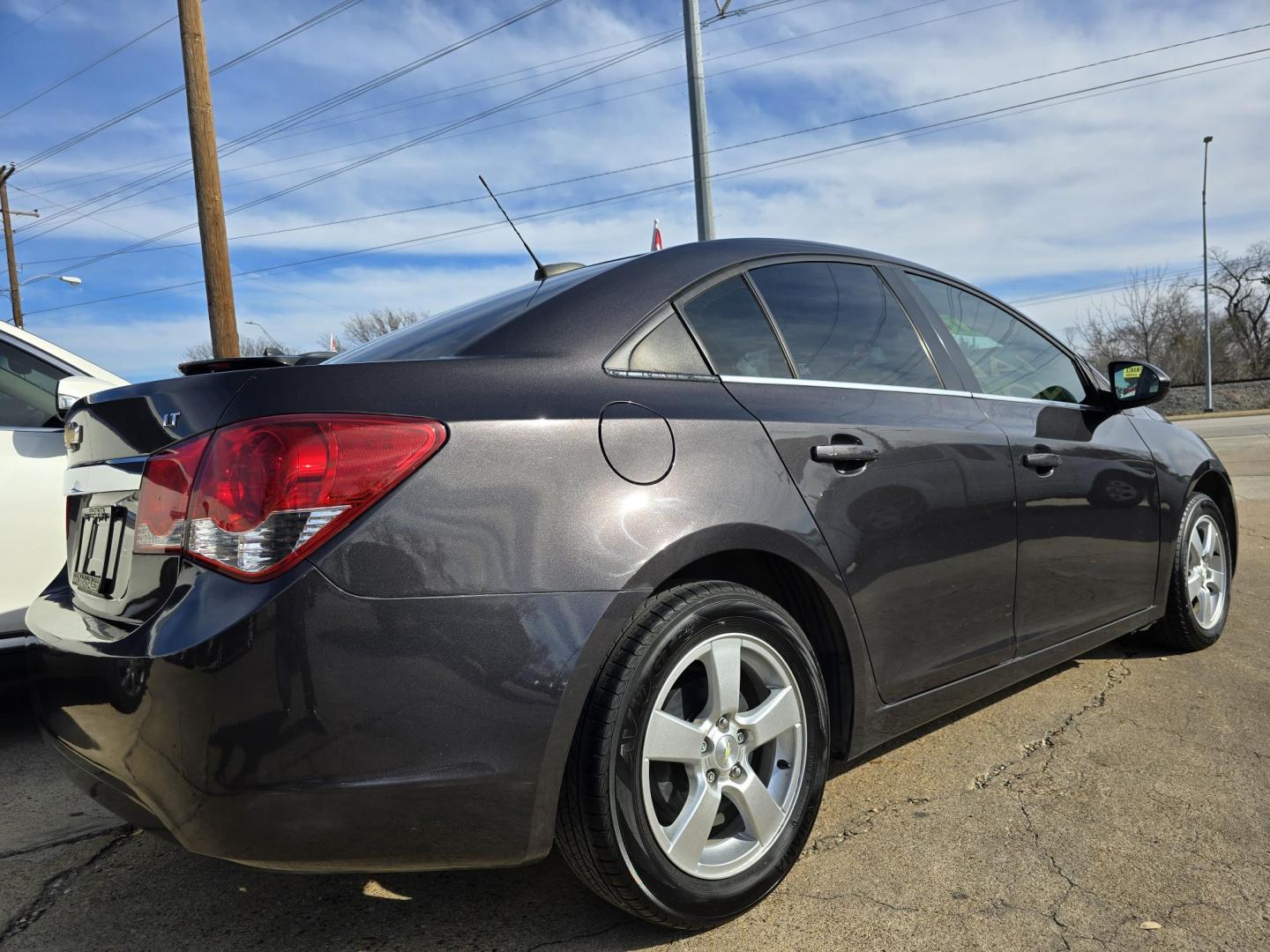 2016 GRAY /BLACK Chevrolet Cruze LT (1G1PE5SB6G7) with an 1.4L L4 DOHC 16V TURBO engine, 6-Speed Automatic transmission, located at 2660 S.Garland Avenue, Garland, TX, 75041, (469) 298-3118, 32.885551, -96.655602 - Welcome to DallasAutos4Less, one of the Premier BUY HERE PAY HERE Dealers in the North Dallas Area. We specialize in financing to people with NO CREDIT or BAD CREDIT. We need proof of income, proof of residence, and a ID. Come buy your new car from us today!! This is a very well cared for 2016 CH - Photo#3