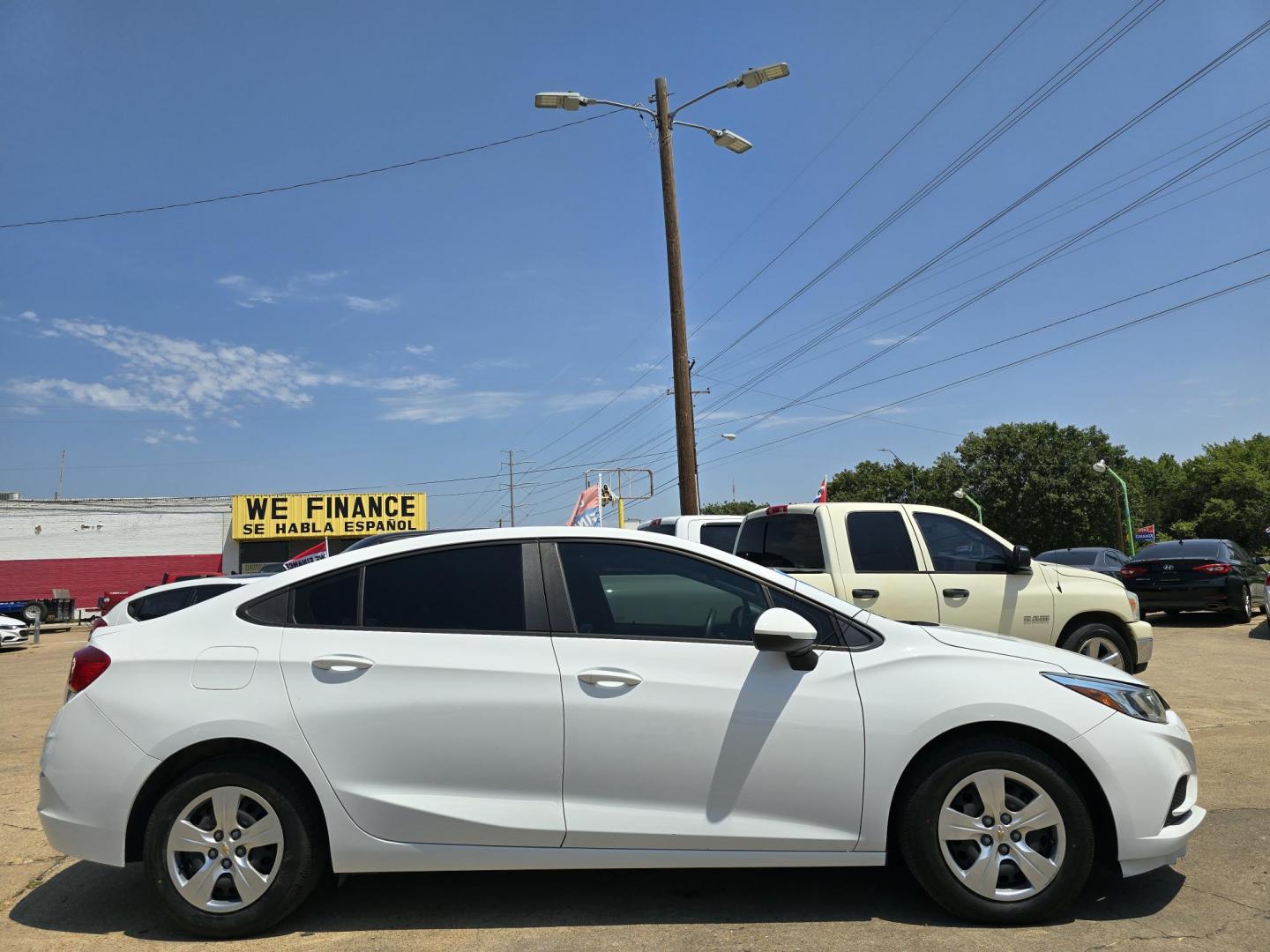 2017 Chevrolet Cruze LS (1G1BC5SM1H7) with an 1.4L L4 DOHC 16V TURBO engine, 6A transmission, located at 2660 S.Garland Avenue, Garland, TX, 75041, (469) 298-3118, 32.885551, -96.655602 - Welcome to DallasAutos4Less, one of the Premier BUY HERE PAY HERE Dealers in the North Dallas Area. We specialize in financing to people with NO CREDIT or BAD CREDIT. We need proof of income, proof of residence, and a ID. Come buy your new car from us today!! This is a very well cared for 2017 CH - Photo#2