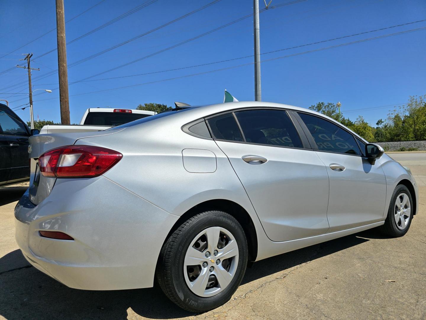 2018 Chevrolet Cruze LS (1G1BC5SM6J7) with an 1.4L L4 DOHC 16V TURBO engine, 6A transmission, located at 2660 S.Garland Avenue, Garland, TX, 75041, (469) 298-3118, 32.885551, -96.655602 - Photo#3